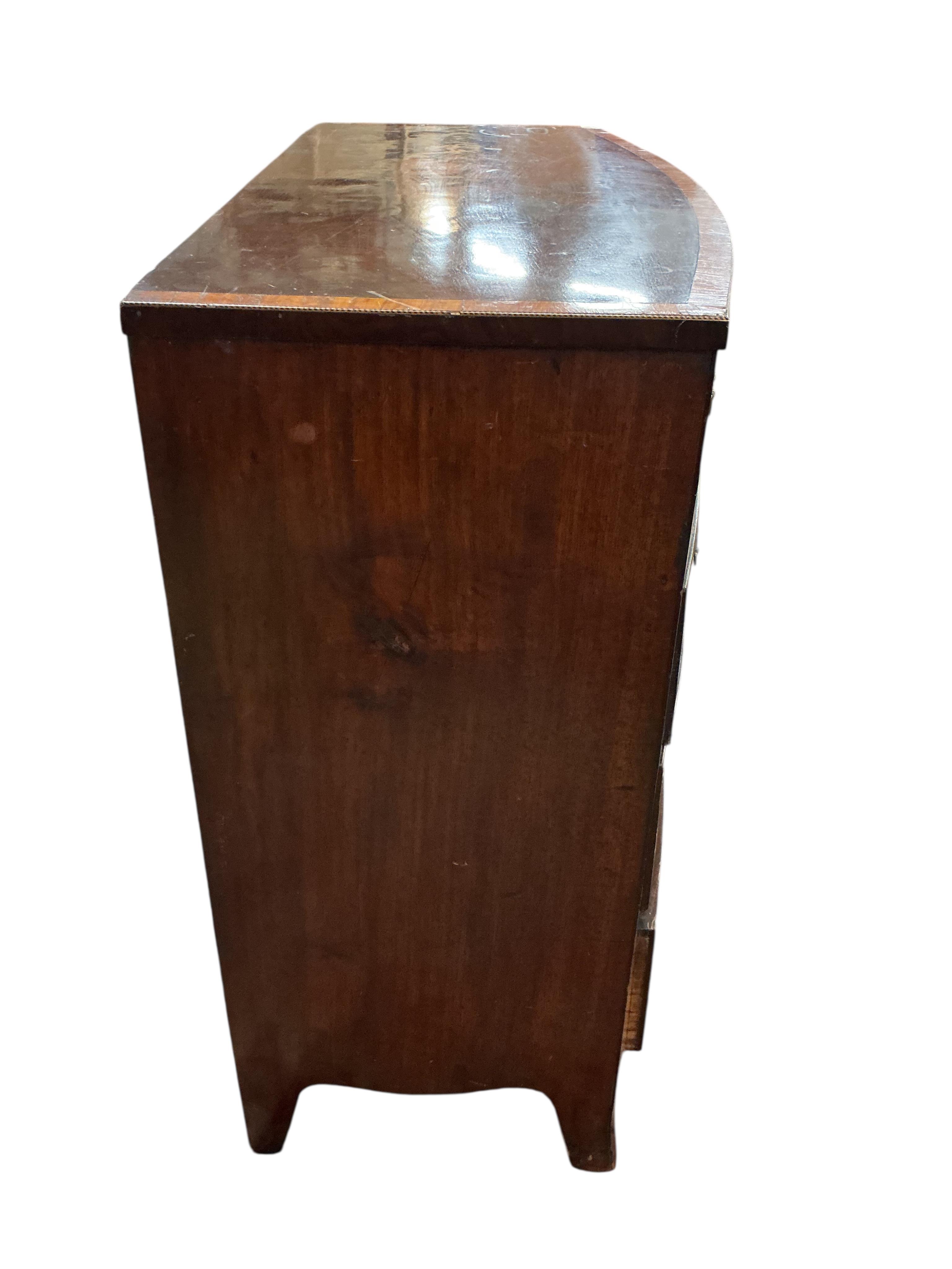 A Regency satinwood banded mahogany bow front chest, width 105cm, depth 51cm, height 102cm